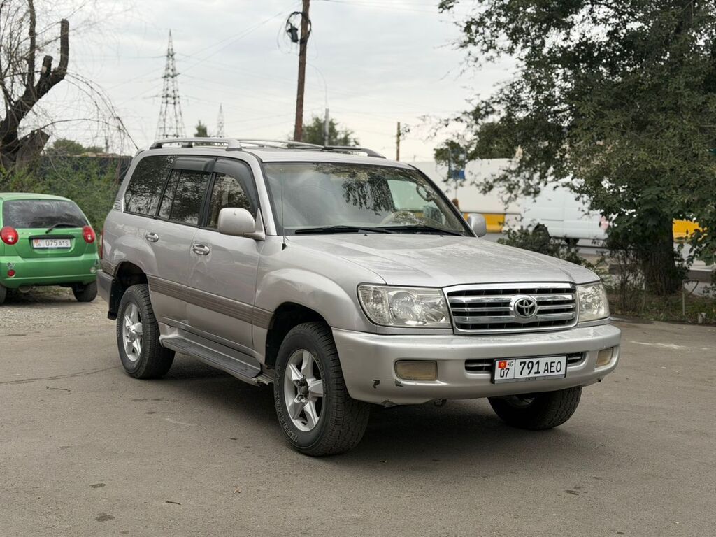 Toyota Land Cruiser: 1999 г., 4.7 л, Автомат, Бензин, Внедорожник: фото 3