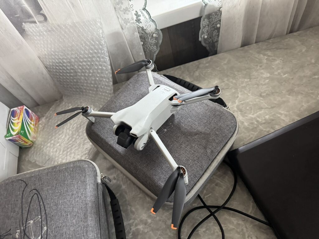 DJI Mini 3 — компактный ультралёгкий квадрокоптер с камерой и пультом: фото 7
