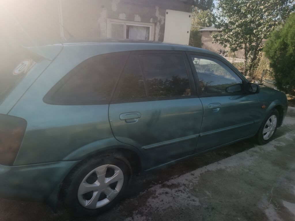 Mazda Familia: 2003 г., 1.6 л, Механика, Газ, Универсал: фото 3