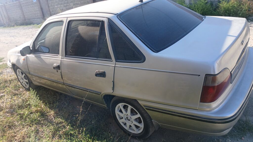 Daewoo Nexia: 2006 г., Механика, Седан: фото 4