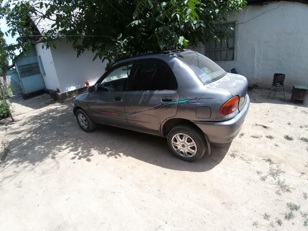 Продаю мазда 121 машина нахаду но дымит матор тяга хороше | 63000 KGS ...