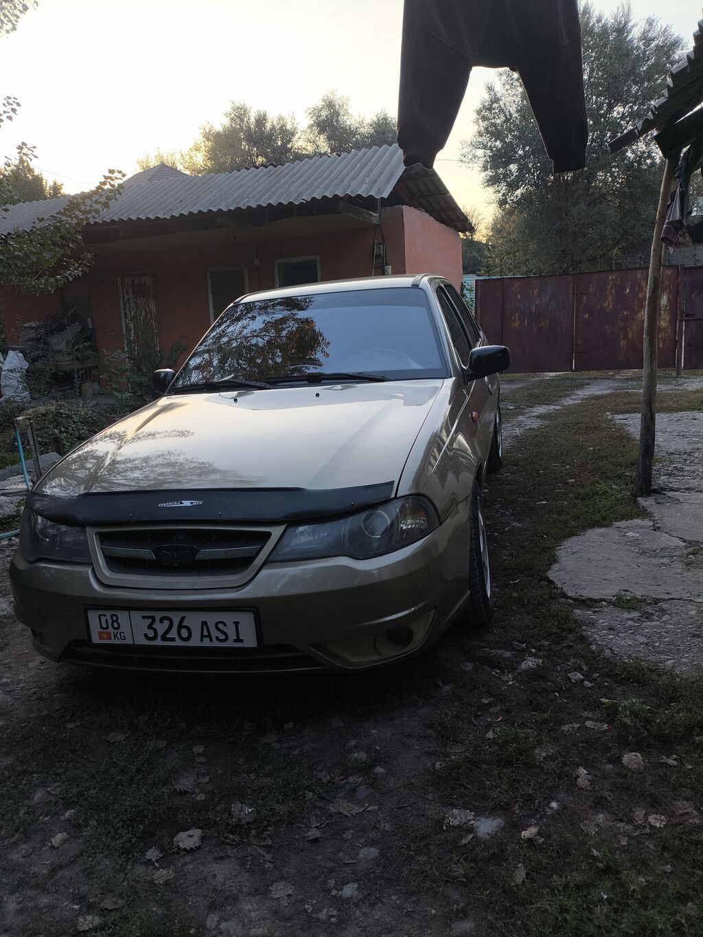 Daewoo Nexia: 2011 г., 1.6 л, Механика, Седан: фото 3