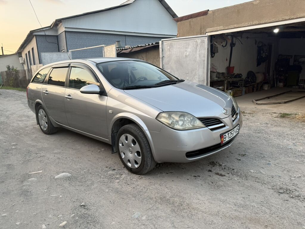 Nissan Primera: 2004 г., Механика, Универсал: фото 7