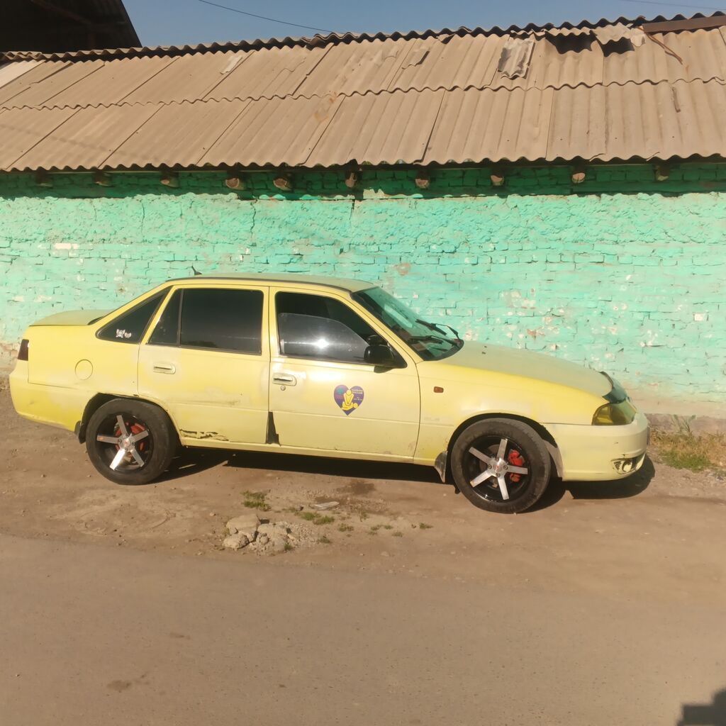 Daewoo Nexia: 2010 г., Седан: фото 5