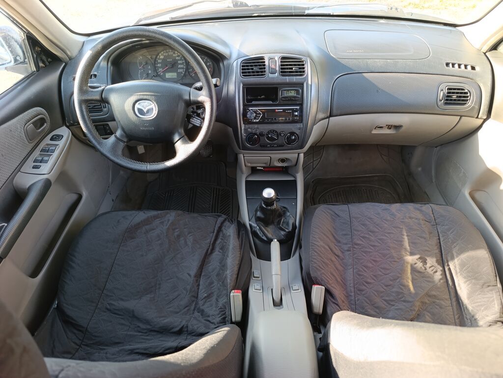 Mazda 323: 2003 г., 1.6 л, Механика, Бензин, Универсал: фото 8