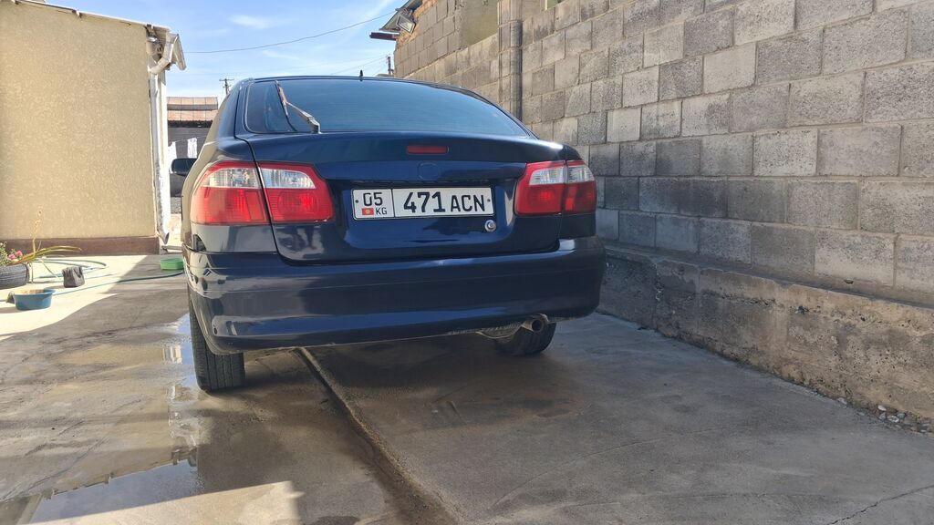 Mazda Capella: 2002 г., Механика, Бензин, Седан: фото 4