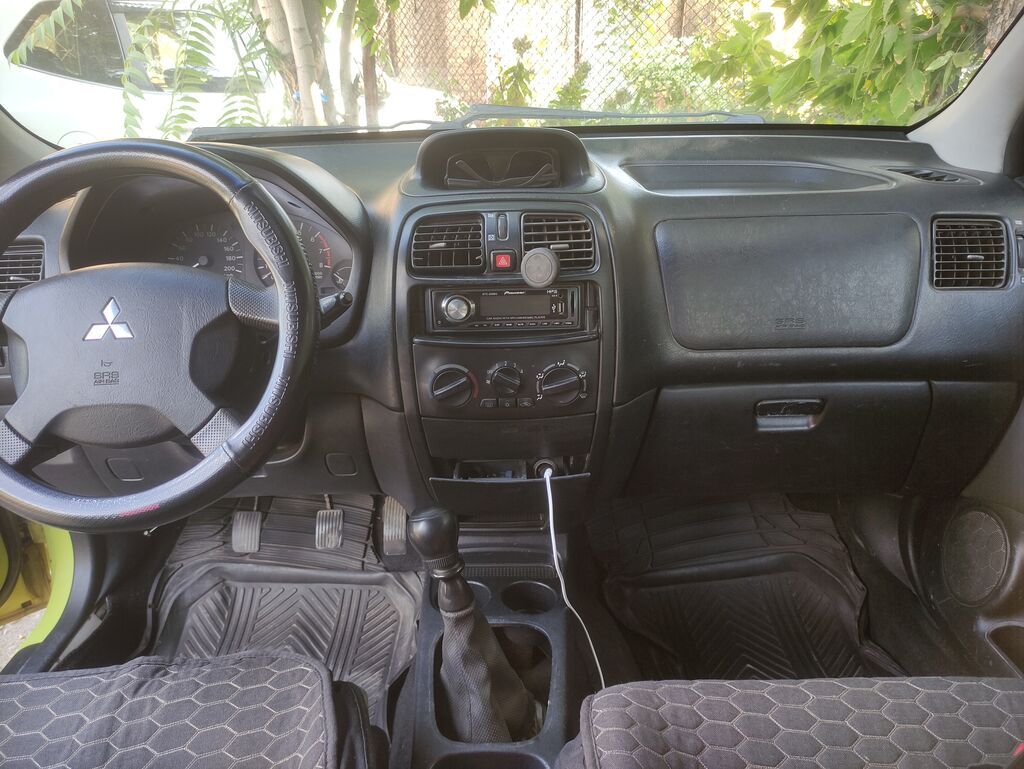 Mitsubishi Space Star: 2002 г., 1.3 л, Механика, Бензин, Универсал: фото 3