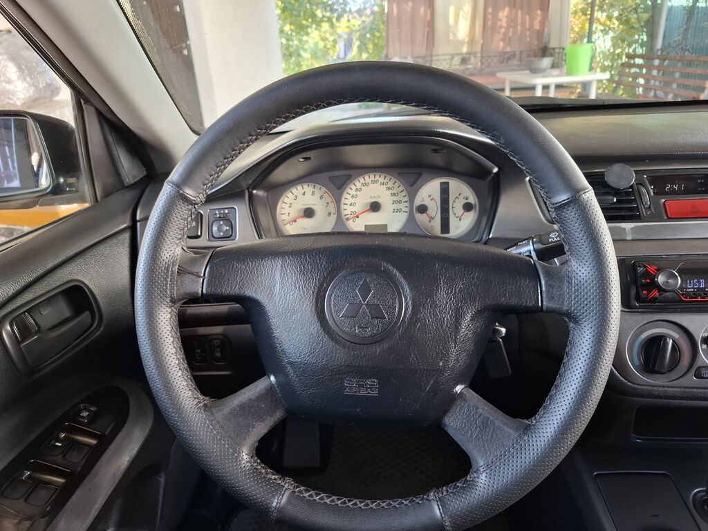 Mitsubishi Lancer: 2005 г., 1.6 л, Автомат, Бензин, Седан: фото 7