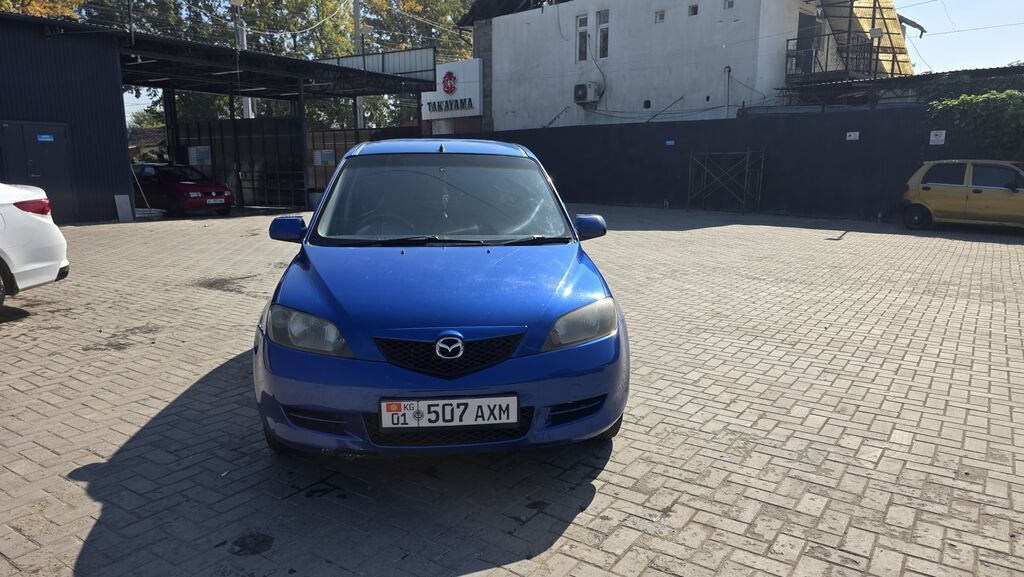 Mazda Demio: 2004 г., 1.3 л, Бензин: фото 2
