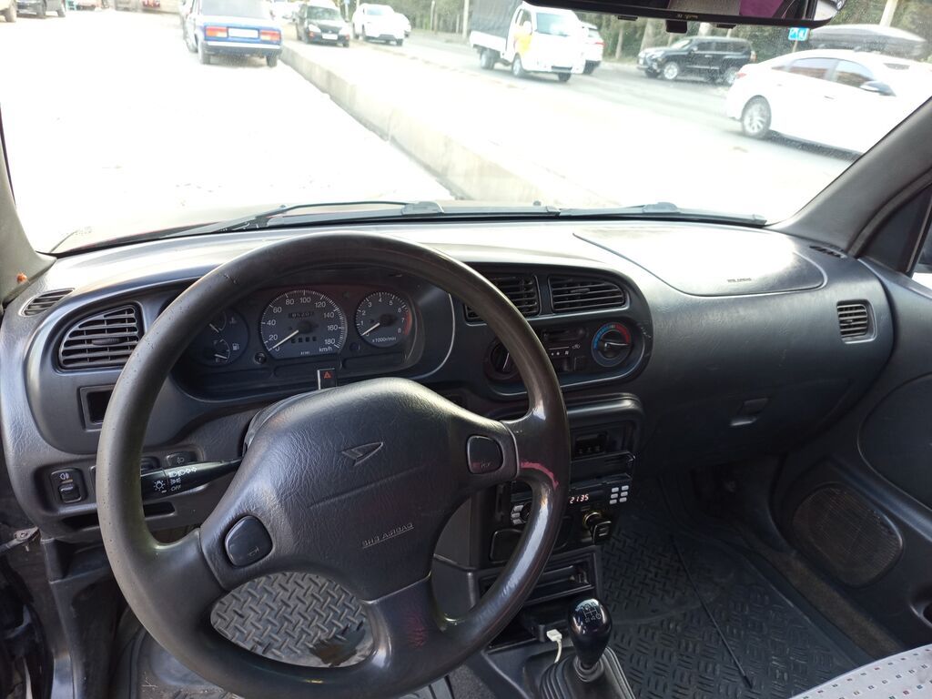 Daihatsu Cuore: 2001 г., 1 л, Механика, Бензин, Купе: фото 6