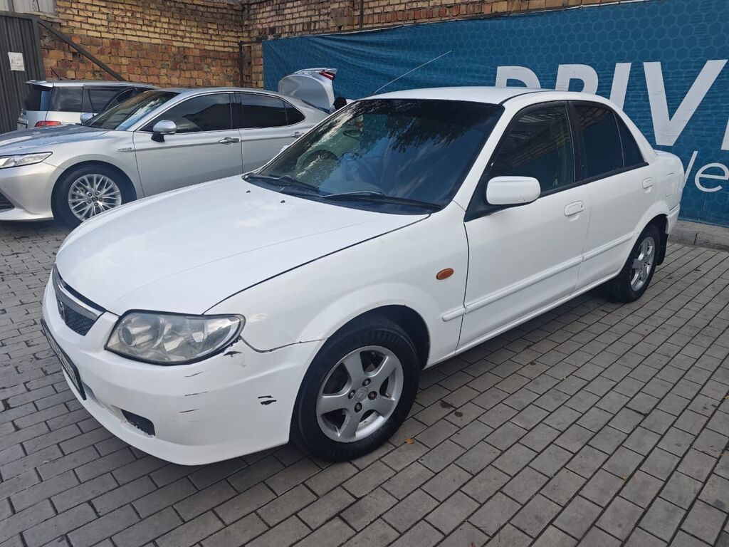 Mazda Familia: 2003 г., 1.5 л, Автомат, Бензин, Седан: фото 3