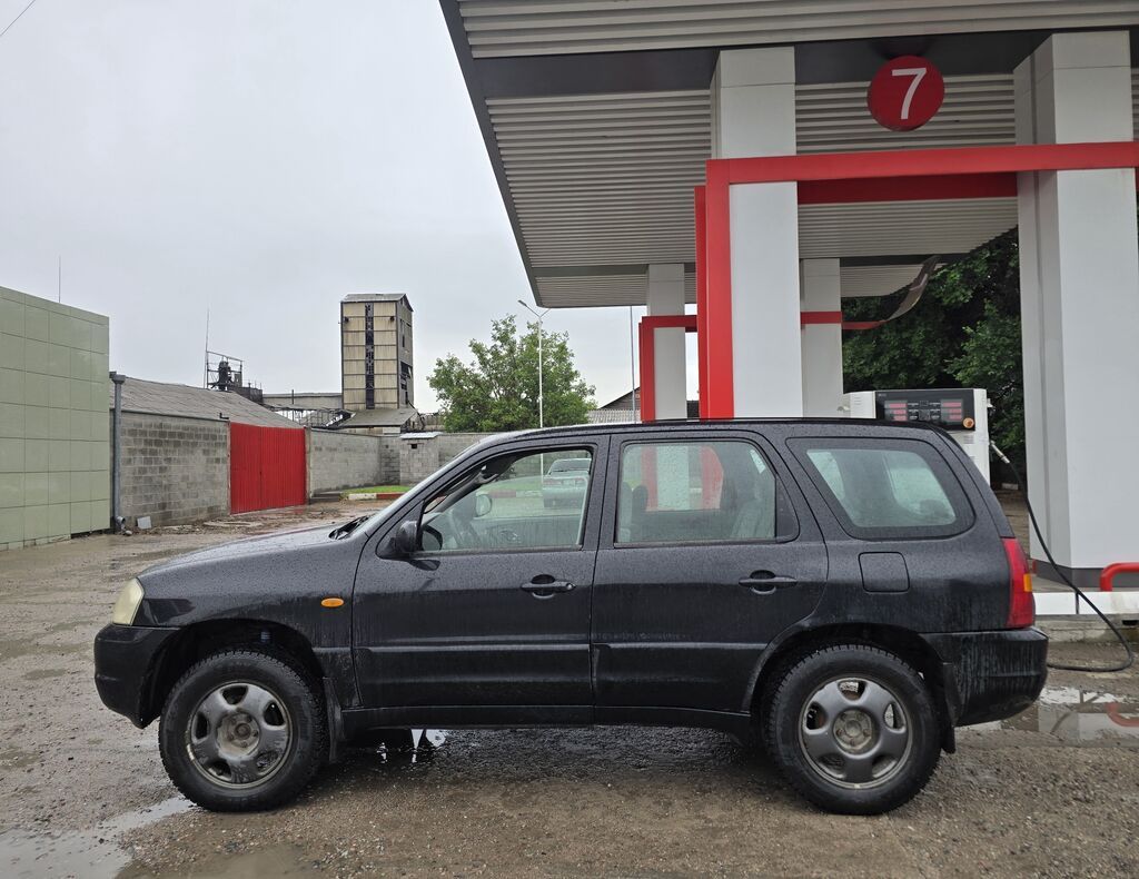 Mazda Tribute: 2001 г., 2 л, Механика, Газ, Внедорожник: фото 3