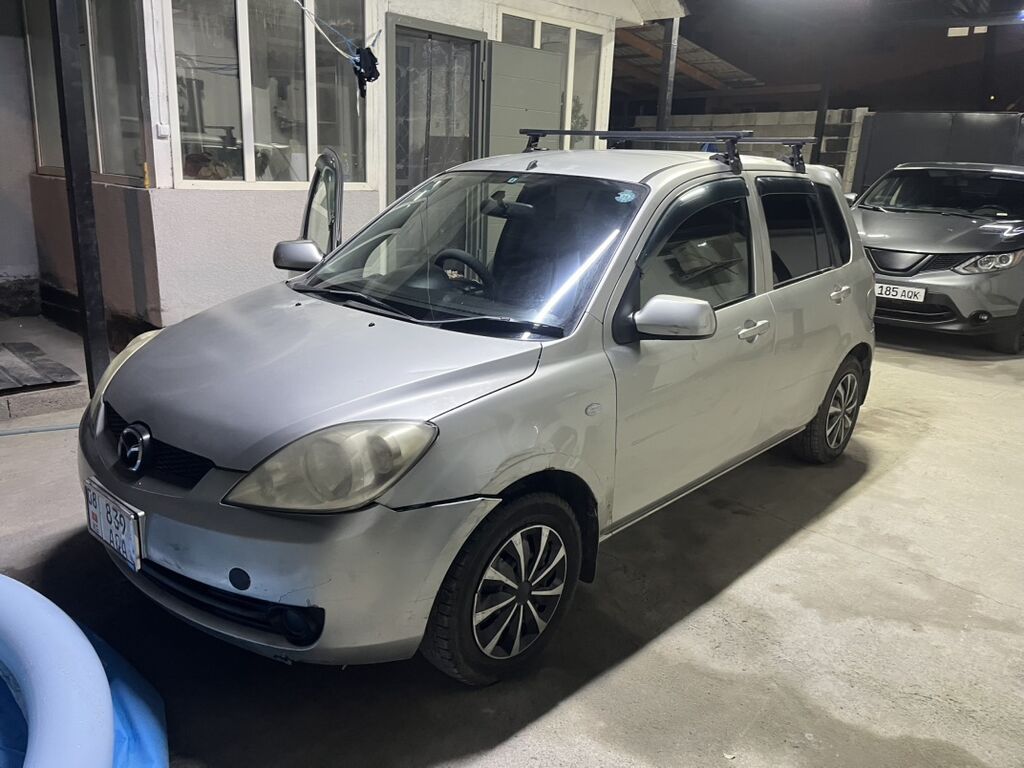 Mazda Demio: 2005 г., 1.3 л, Автомат, Бензин, Хэтчбэк: фото 2