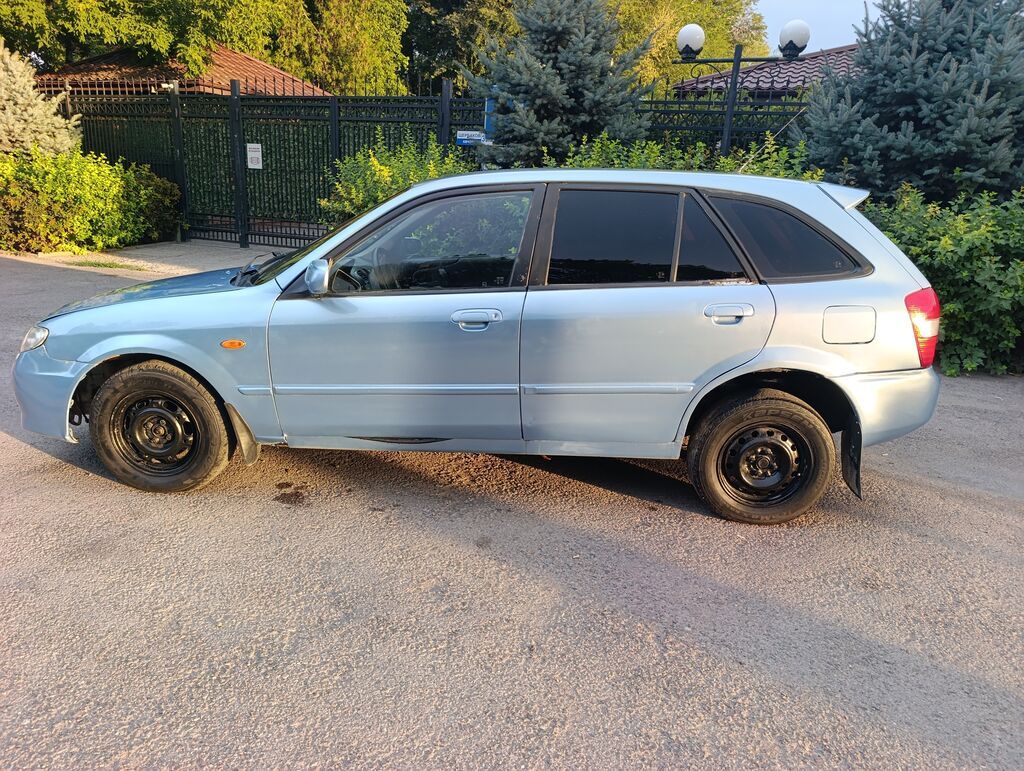 Mazda 323: 2003 г., 1.6 л, Механика, Бензин, Универсал: фото 7