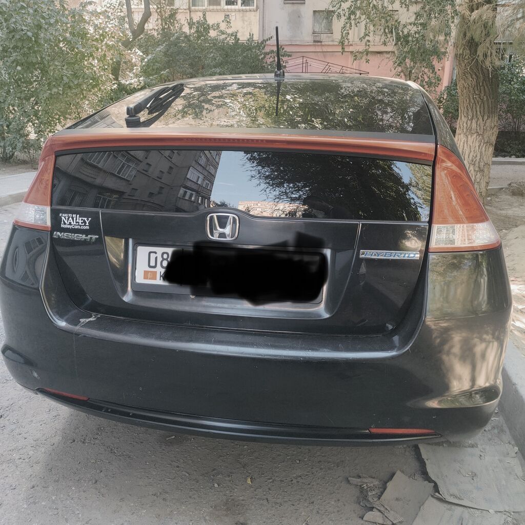 Honda Insight: 2010 г., 1.3 л, Вариатор, Гибрид, Хэтчбэк: фото 2