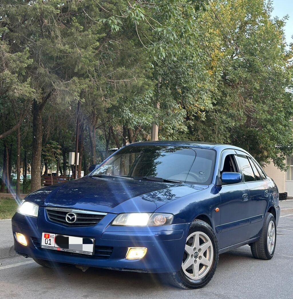 Mazda Capella: 2000 г., 1.8 л, Механика, Бензин, Хэтчбэк: фото 2