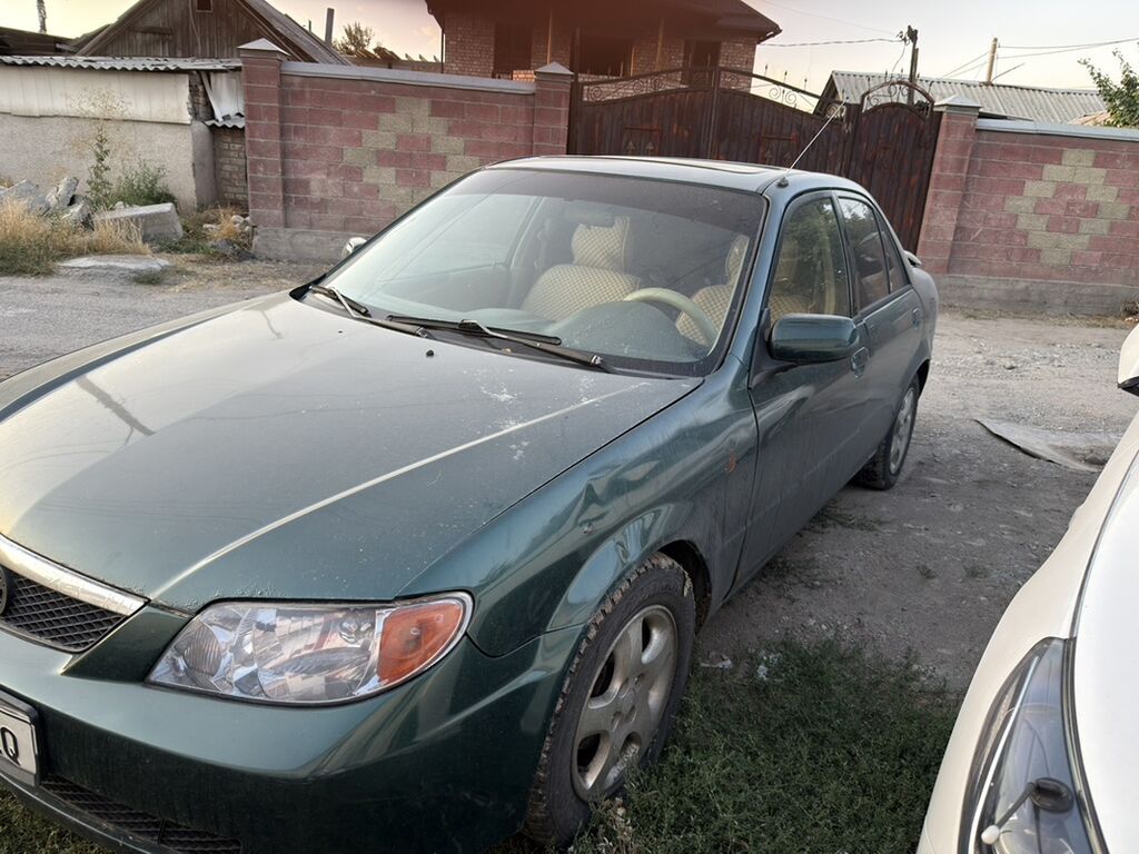 Mazda Protege: 2002 г., Седан: фото 2