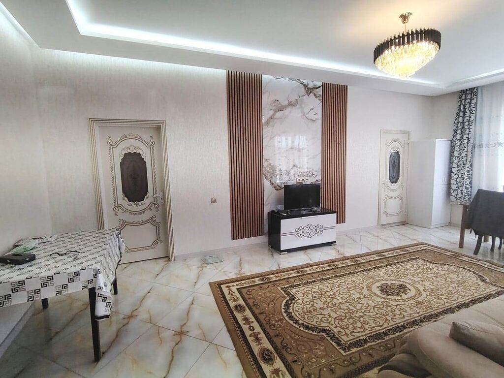 2 otaqlı, 82 kv. m, Yeni təmirli