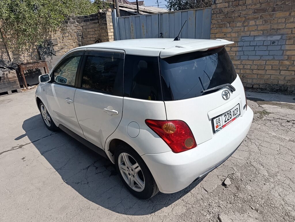 Toyota Ist: 2002 г., 1.5 л, Автомат: фото 5