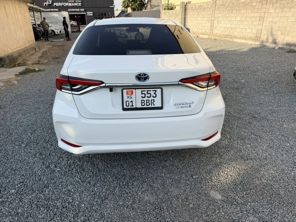 Toyota Corolla: 2019 г., 1.8 л, Автомат, Гибрид, Седан: фото 4
