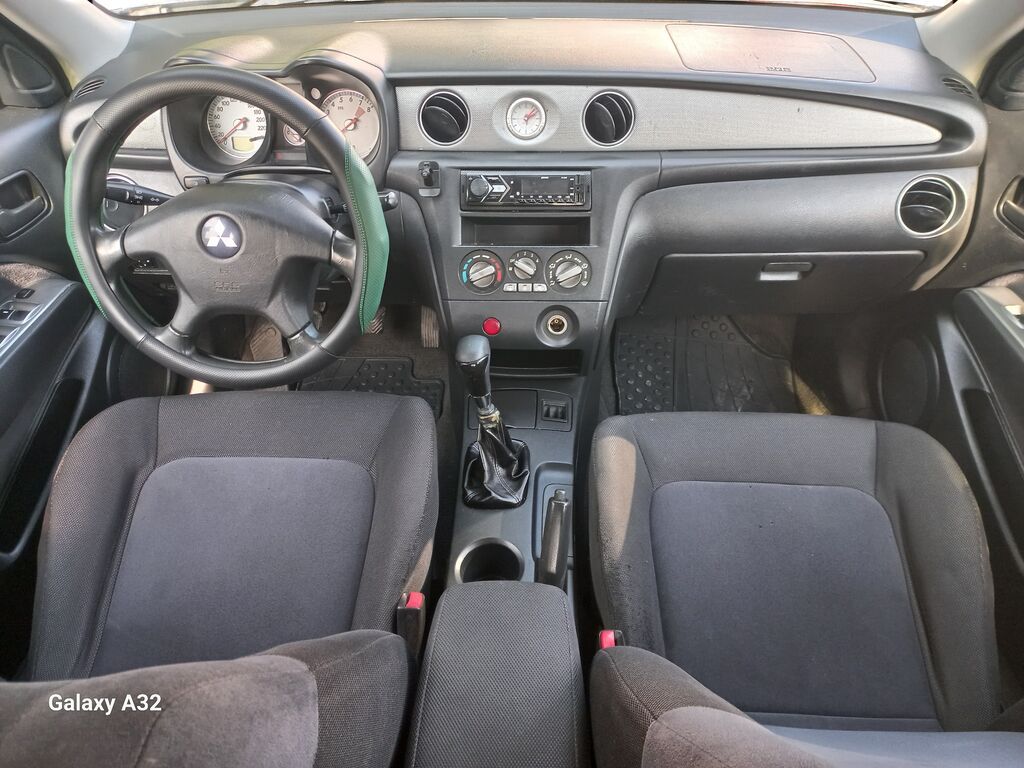 Mitsubishi Outlander: 2003 г., 2 л, Механика, Бензин, Кроссовер — фото 7