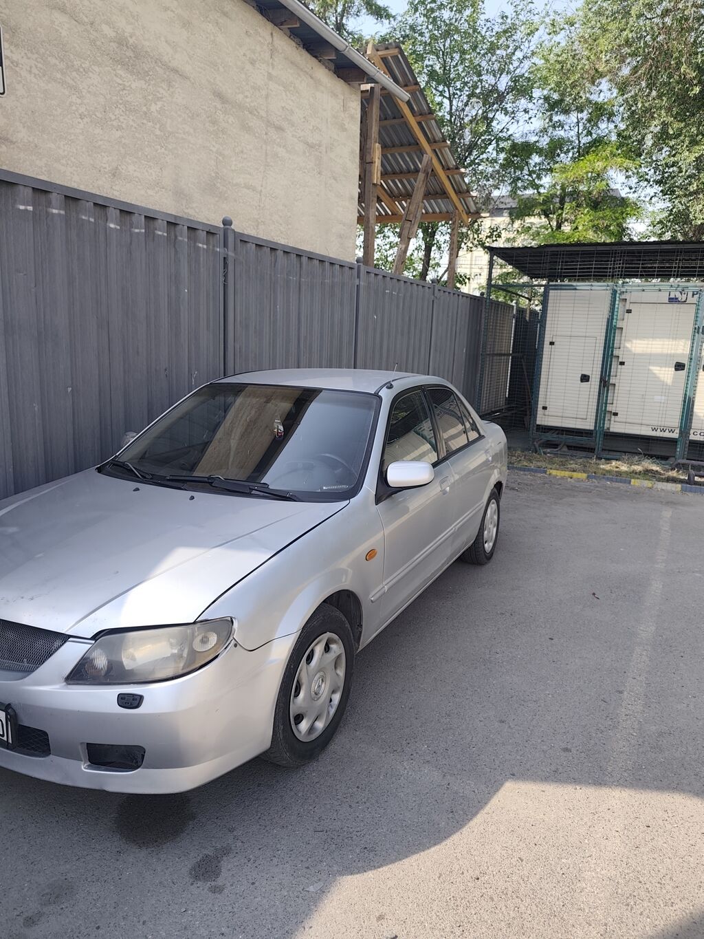 Mazda 323: 2003 г., 1.6 л, Автомат, Бензин, Седан: фото 5