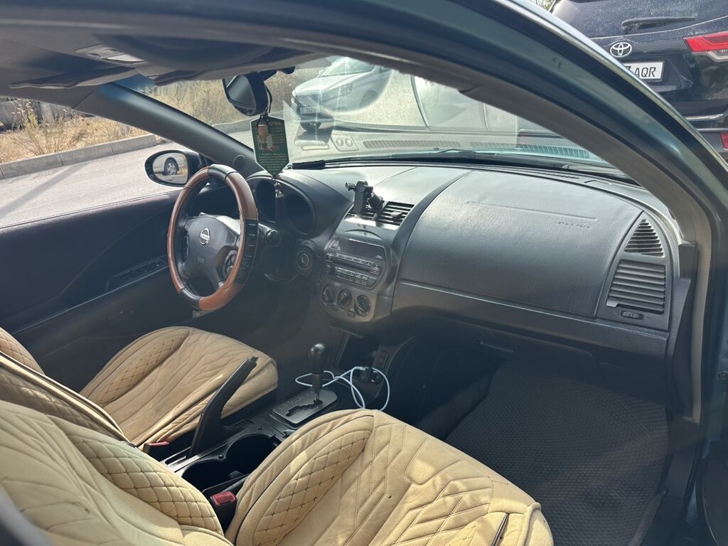 Nissan Altima: 2001 г., 2.5 л, Автомат, Газ, Седан: фото 4