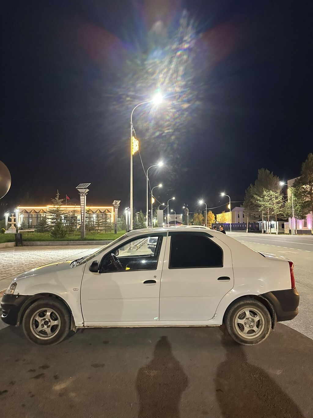 Renault Logan: 2012 г., 1.4 л, Механика, Бензин, Седан: фото 2