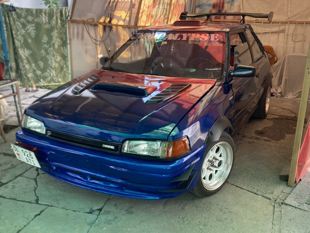 Mazda 323 1991 г., тюнинг, хэтчбек: фото 8