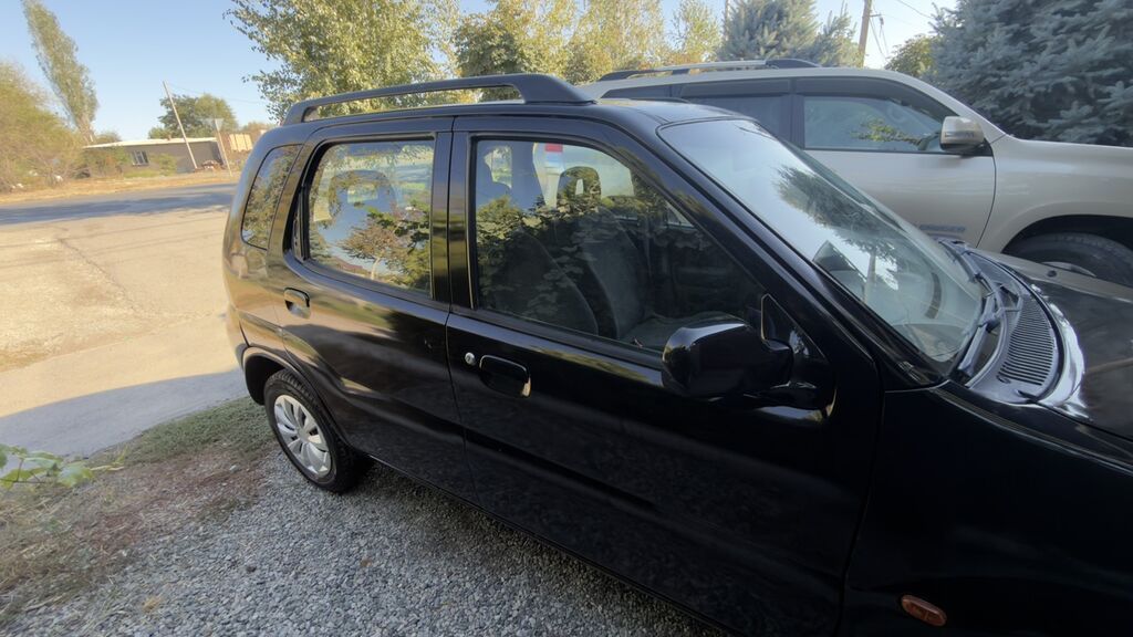 Suzuki Ignis: 2003 г., 1.3 л, Механика, Бензин, Кроссовер: фото 4