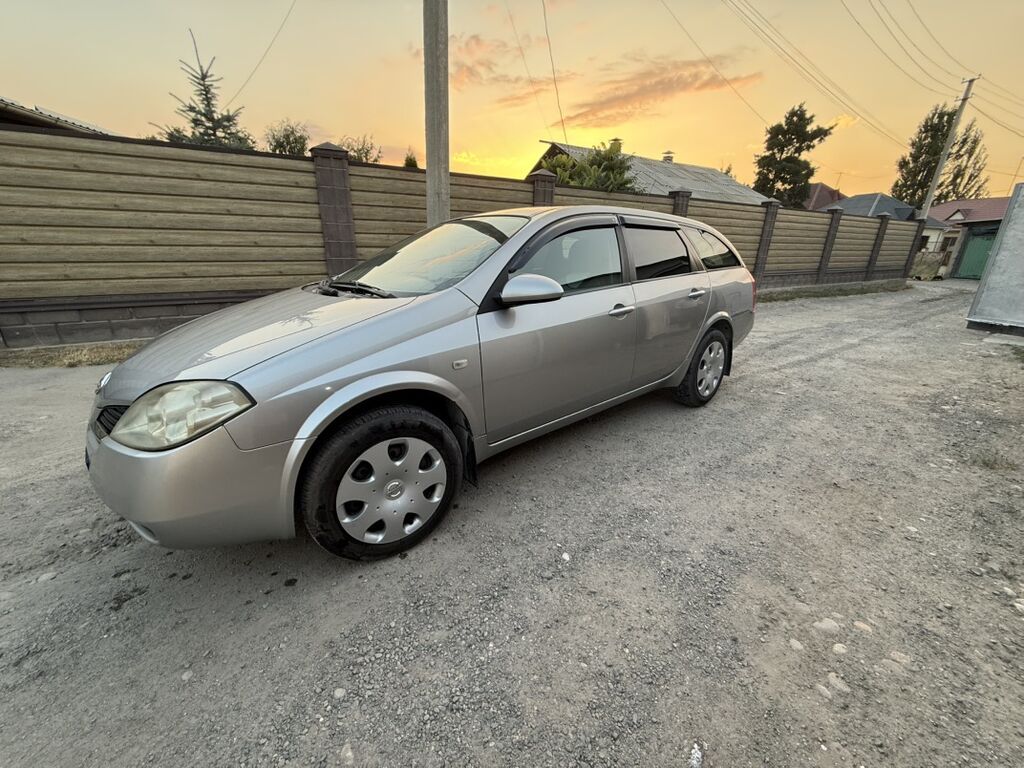 Nissan Primera: 2004 г., Механика, Универсал: фото 8