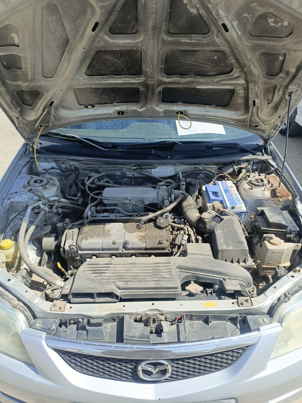 Mazda 323: 2002 г., Механика, Бензин, Универсал: фото 6