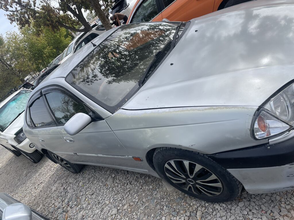 Toyota Avensis: 2002 г., Бензин, Седан: фото 2