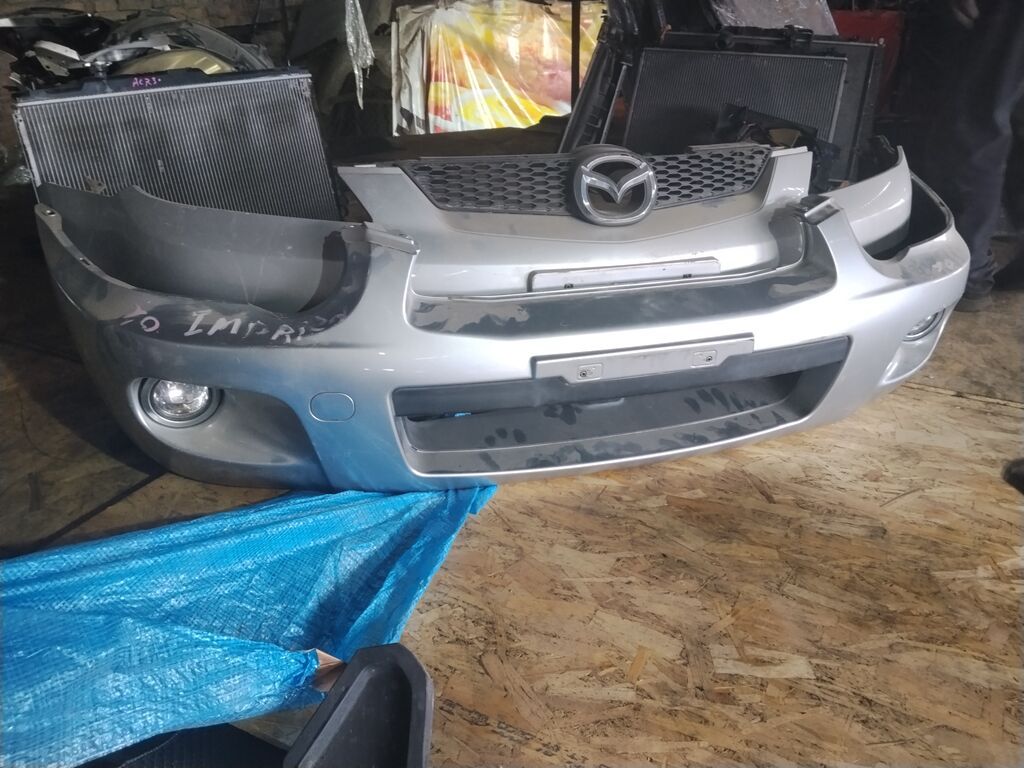 Передний бампер в сборе для Mazda (эмблема Mazda, решётка радиатора и: фото 3