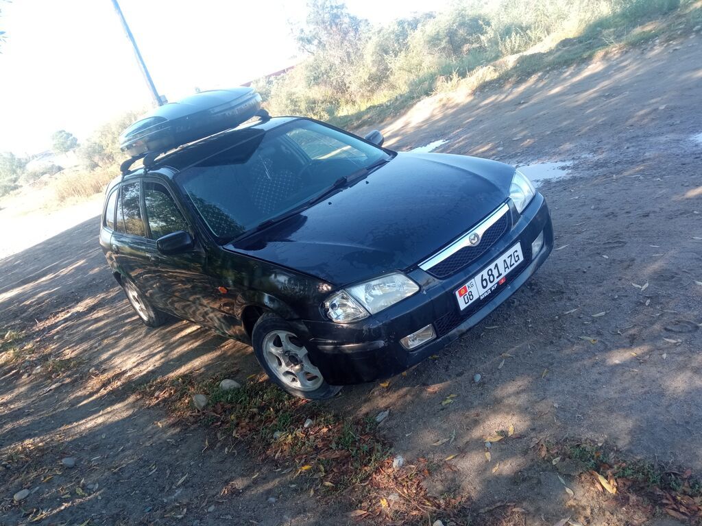 Mazda Familia: 1999 г., 1.6 л, Механика, Бензин, Универсал: фото 3