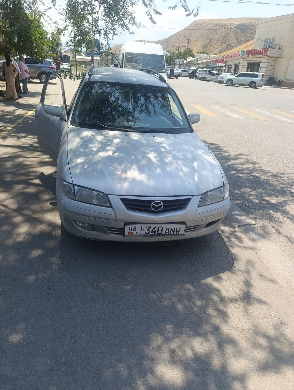 Mazda Capella 2001 г., универсал, 2.0 л, механика: фото 3