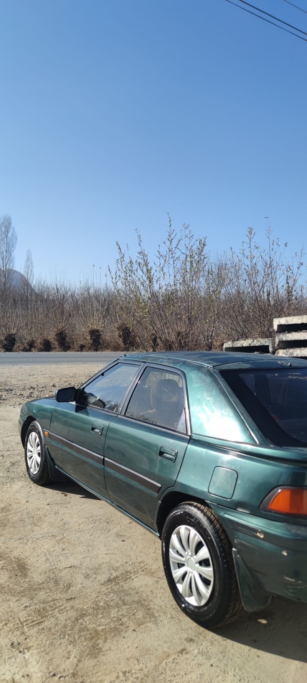 Mazda 323: 1994 г., 1.6 л, Купе — фото 4