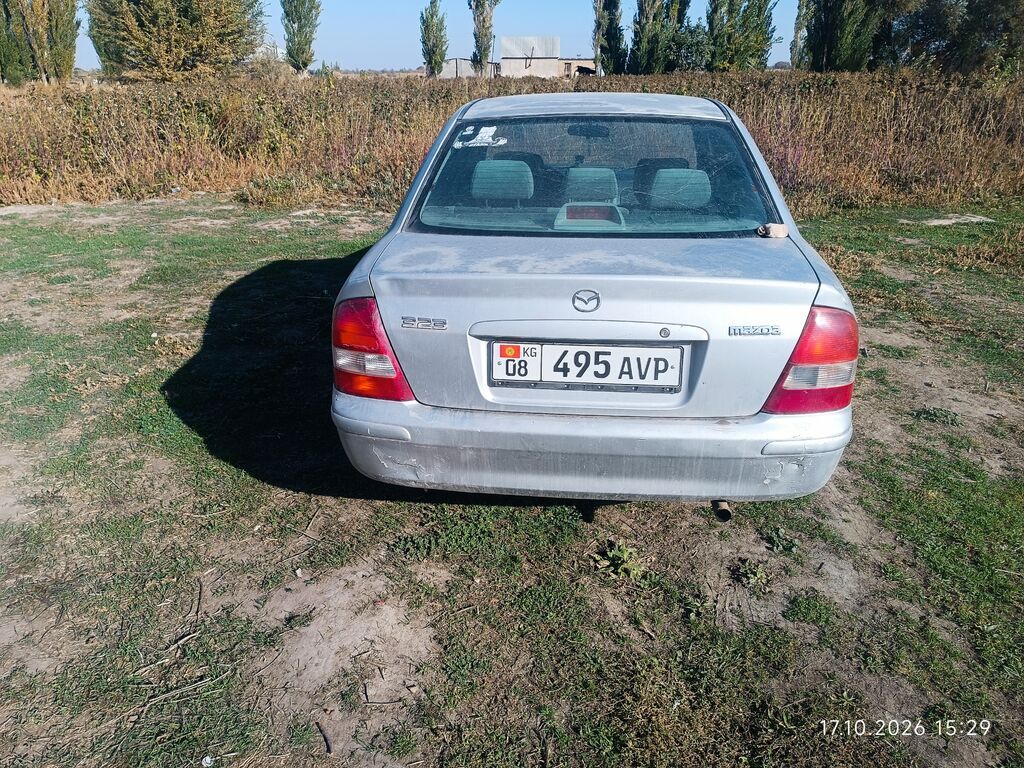 Mazda 323: 1998 г., 1.5 л, Автомат, Бензин, Седан: фото 1