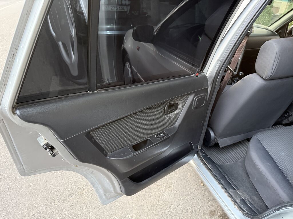 Daewoo Nexia: 2009 г., 1.5 л, Механика, Бензин, Седан: фото 8