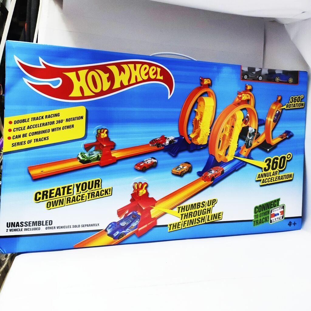 Hot wheels гигантская петля. Настоящий хот Вилс. Трек хот Вилс на 4 полосы. Трек хот Вилс колесо. Хот Вилс Дисней.