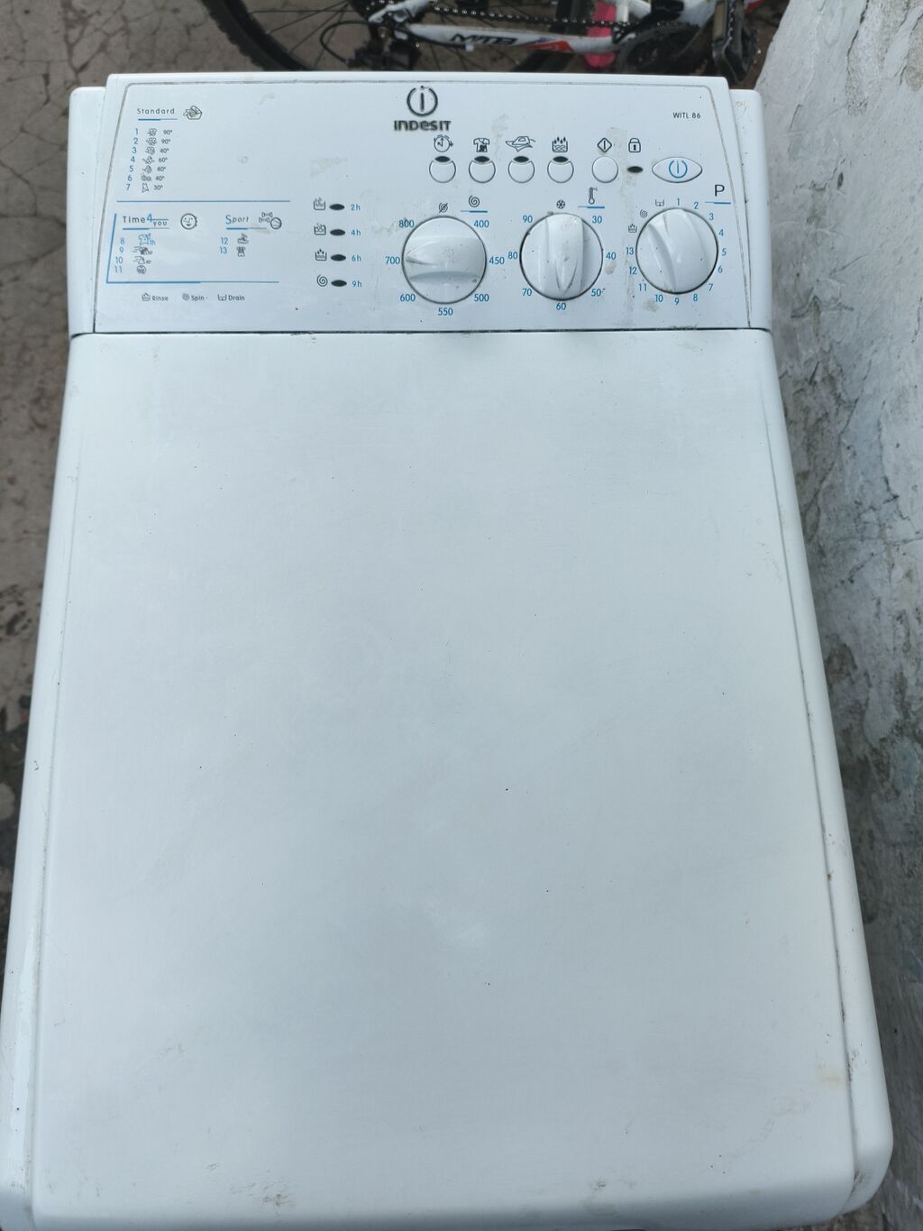 Стиральная машина Indesit WITL 86, вертикальная загрузка. Особенности: фото 2