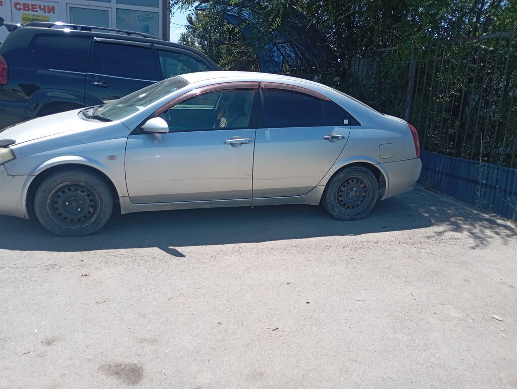 Nissan Primera: 2001 г., 2 л, Автомат, Бензин, Седан: фото 6
