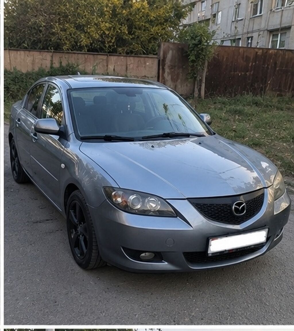 Mazda 3: 2008 г., 2 л, Автомат, Бензин, Седан: фото 2