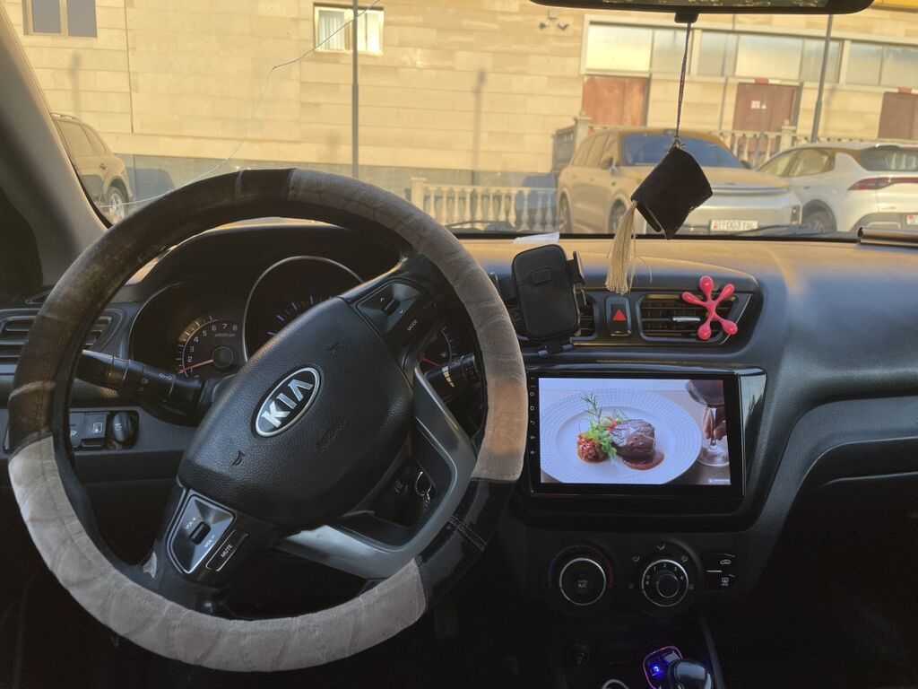 Kia Rio: 2014 г., 1.6 л, Автомат, Газ, Седан: фото 5