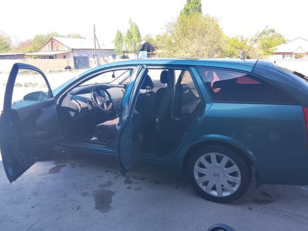 Nissan Primera: 2002 г., 2 л, Механика, Бензин, Универсал: фото 8