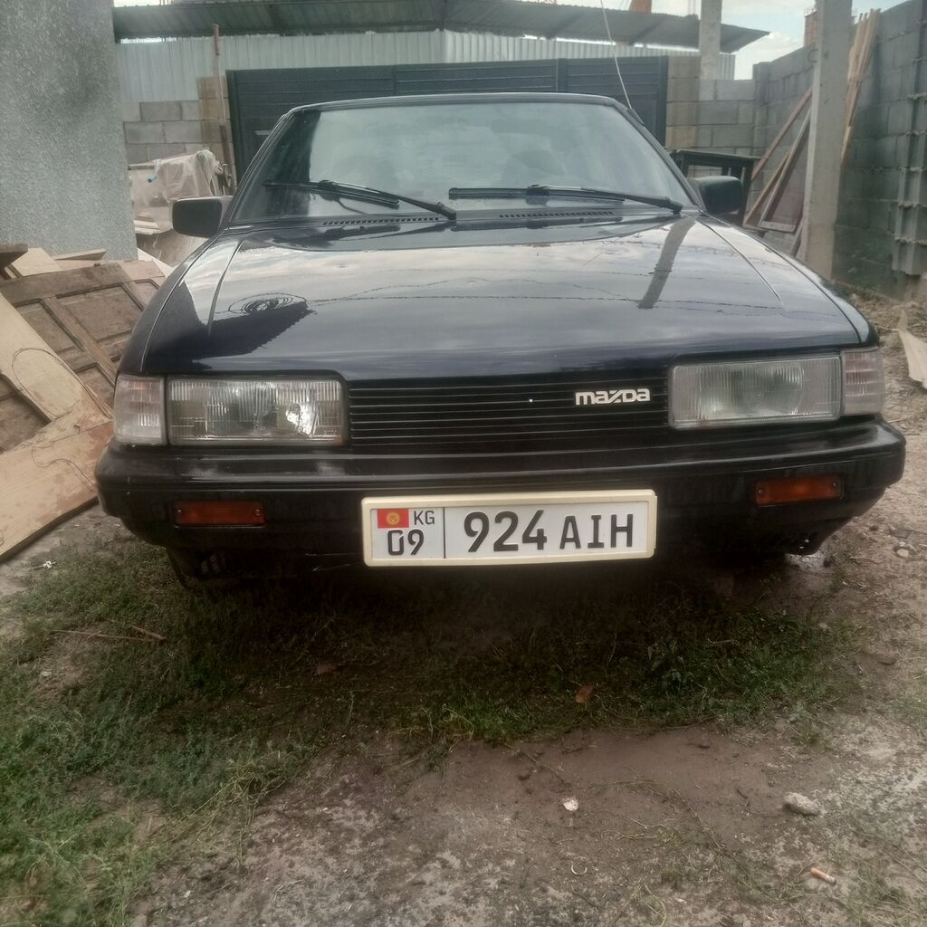 Mazda 626: 1980 г., Седан