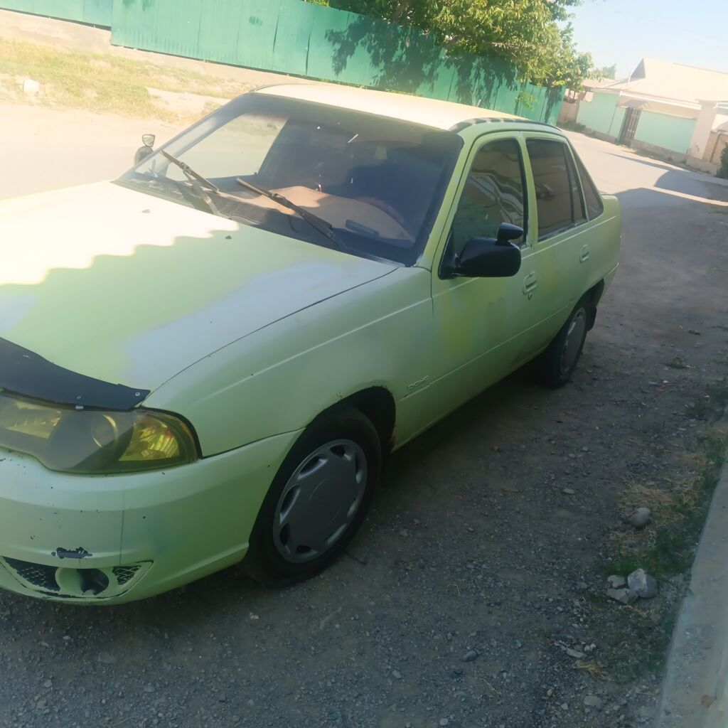 Daewoo Nexia: 2010 г., Седан: фото 3